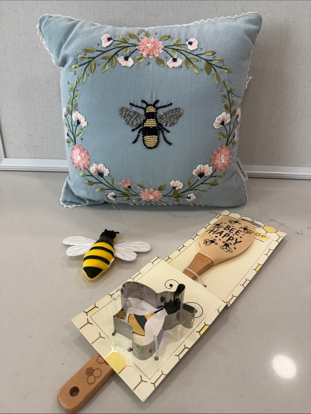 Embroidered Bee Throw Pillow and spatula